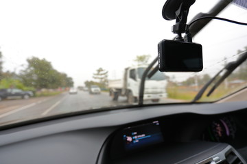 video camera recorder inside car driving rainy day
