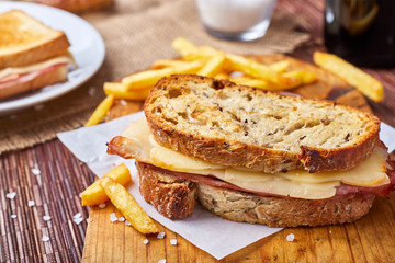 Grilled ham and cheese sandwich with french fries
