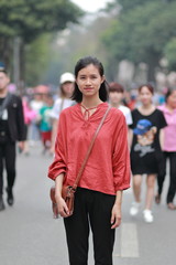 young woman in the crowd