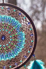 Handmade dream catcher with feathers threads and beads rope hanging