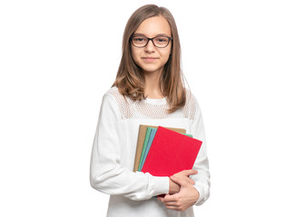 Portrait of beautiful Teen Girl in Eyeglasses with Books. Portrait of School Teenager holding books, isolated on white background. Happy smiling college child looking at camera.