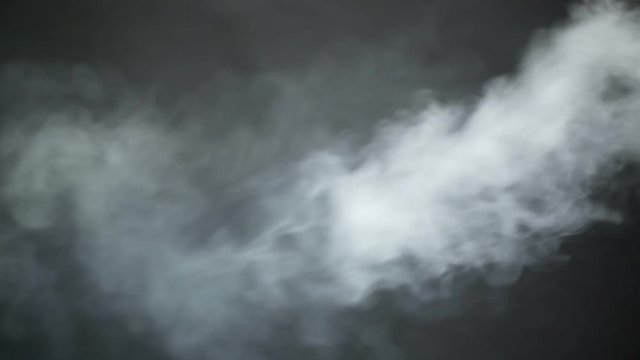 vapor from e-cigarette on black background