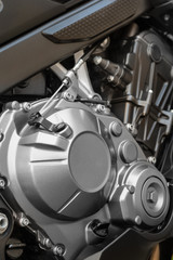 Closeup of motorcycle engine detail.