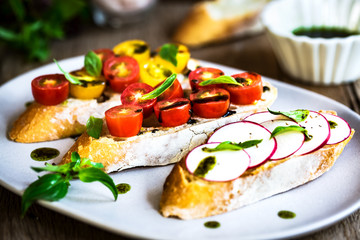 Bruschetta with Cherry Tomatoes and Radish with Basil oil,