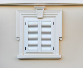 The windows in the old style, closed space, white tone