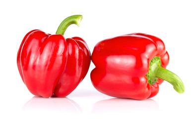 Pair of red bellpepper isolated on white background