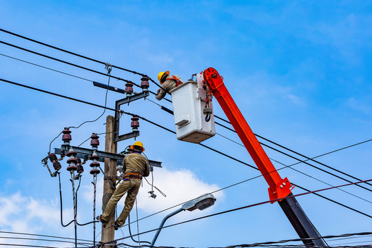 The electrical worker  are repairing the electrical system