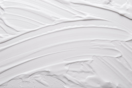 White texture of cosmetic body care cream background