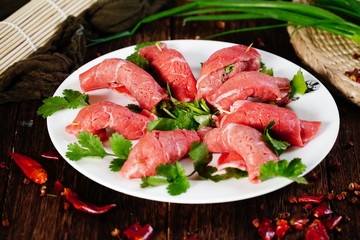 Fresh caraway beef in a white dish