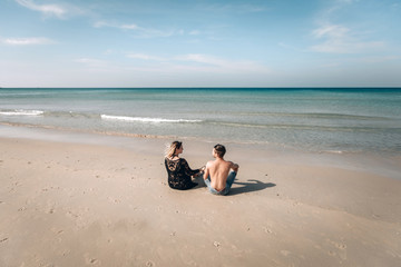 Romantic couple on the beach. Back View