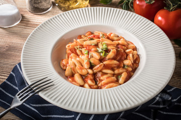 Cavatelli pasta with fresh tomato sauce.