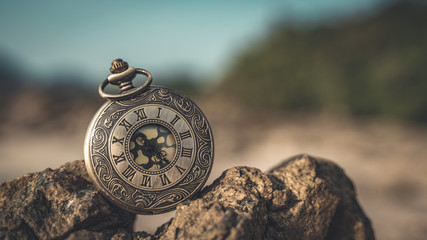 Vintage Engraved Watch On Stone Blurred Background