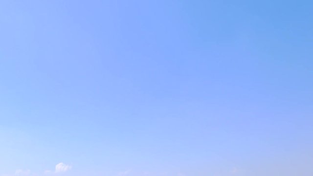 Blue Sky Background, Simple Natural Texture Template of Sky with  Clouds. Backdrop of Pale Light Blue Color