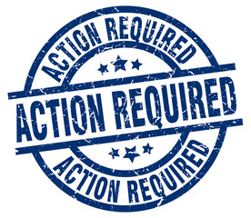 action required blue round grunge stamp