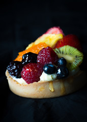 Fruit tart on a black background
