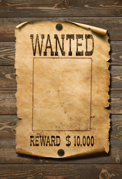 Wanted wild west poster on old wood background