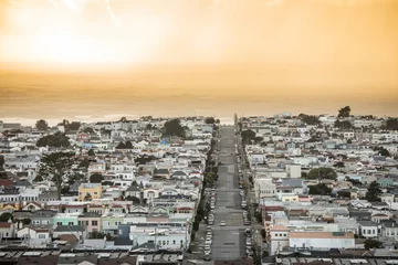 Raamstickers View of the sunset district of San Francisco as a rain storm moves in at sunset © Wollwerth Imagery