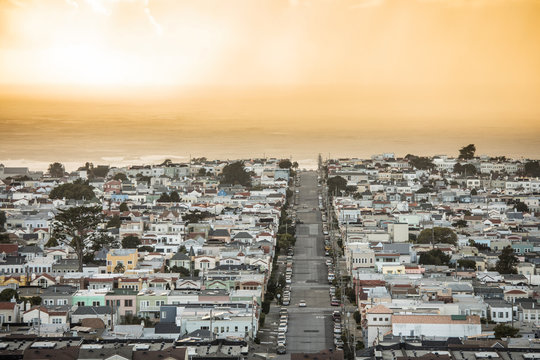View of the sunset district of San Francisco as a rain storm moves in at sunset