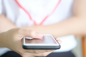 Hand of woman she is using smartphone and an internet network buy shopping online .Technology and Business concept