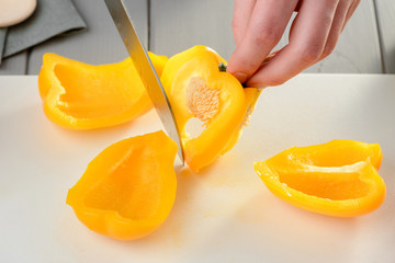 Close up on cutting pepper