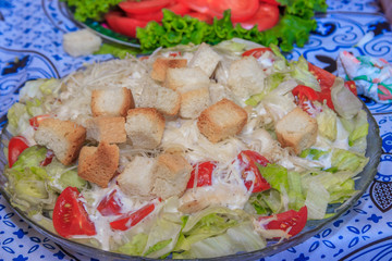 Caesar salad plate. Festive Salad. Greek salad