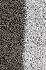New draining asphalt road detail with black and white color