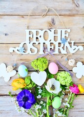 Ostern - Frohe Ostern - Osternest mit Eiern und Blumen