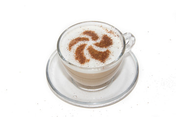 A cup of cappuccino on a white background with a pattern of cinnamon. An isolated cup of coffee. Cappuccino coffee