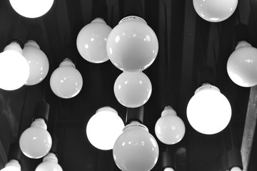 Black and White Photo of Ceiling Bulb 