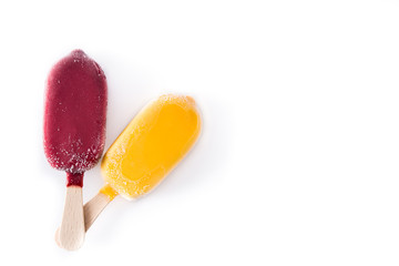 Yellow and red popsicles isolated on white background. Top view. Copyspace