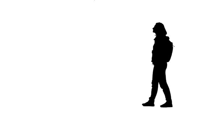 Girl walking taking a photo and selfie. Silhouette. White background. Side view