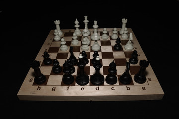 Chessboard and the chessmen for strategy backdrop