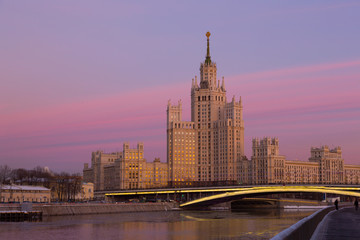 Fototapeta na wymiar One of seven Stalin skyscrapers: the high-rise building on Kotelnicheskaya Embankment in sunset, Moscow