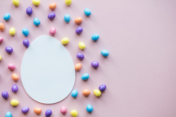 Easter egg lay flat background. Blank white egg ready for text
