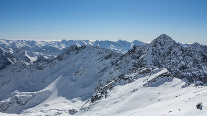 Fototapeta na wymiar Panoramic view at the top of the mountain, Italian Alps. 