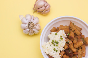 Fried Rye bread croutons with garlic and sauce. Top view, copy text