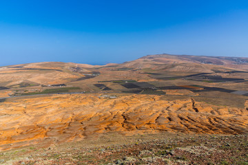 Spain, Lanzarote, Colorful volcanic soil countryside from scenic viewpoint