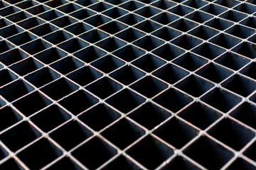 Metal background with square holes.