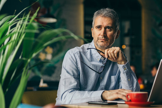 businessman on coffee break in cafe bar