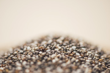 Close-up of raw, unprocessed, dried black chia seeds