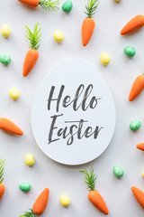 Easter message background with easter eggs and carrots