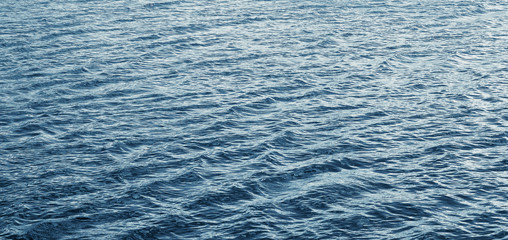 Water texture with waves during windy weather_
