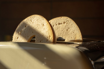 sliced bagel in toaster