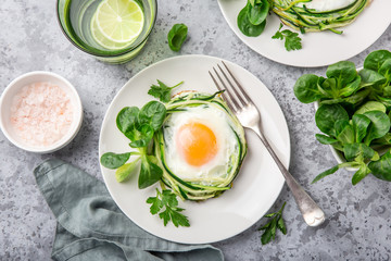fried egg in zucchini noodle nest