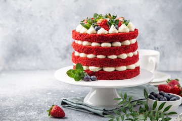 festive  Red Velvet cake on white cake stand - 258979751