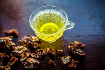 Raw organic garmalo or amaltas or golden shower tree with its extracted herbal and beneficial tea...