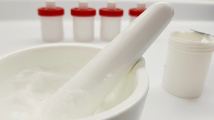 Ointment, mortar and container