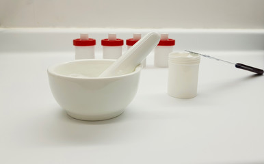 Ointment, mortar and container