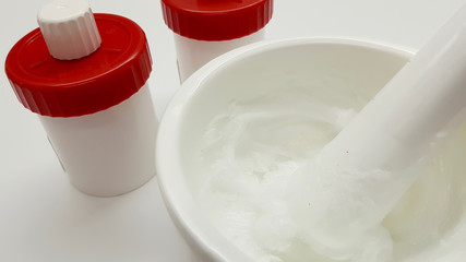 Ointment, mortar and container