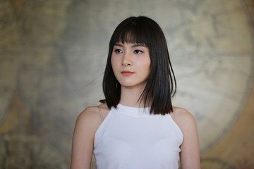 headshot with a beautiful brunette woman sincere happy cheerful positive expression